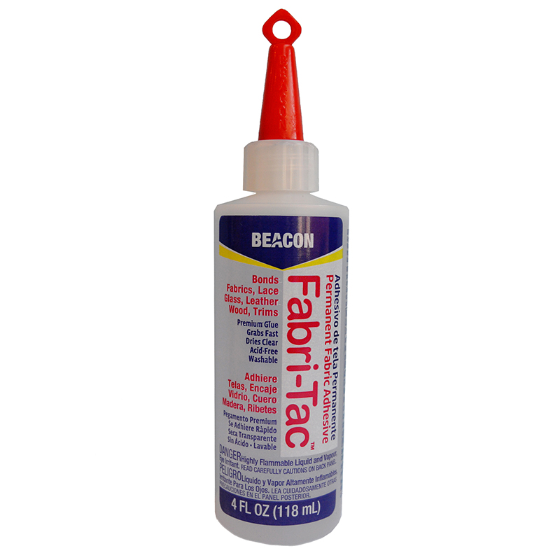 Beacon Fabri-Tac Permanent Adhesive with small ring on the cap and instruction on the bottle